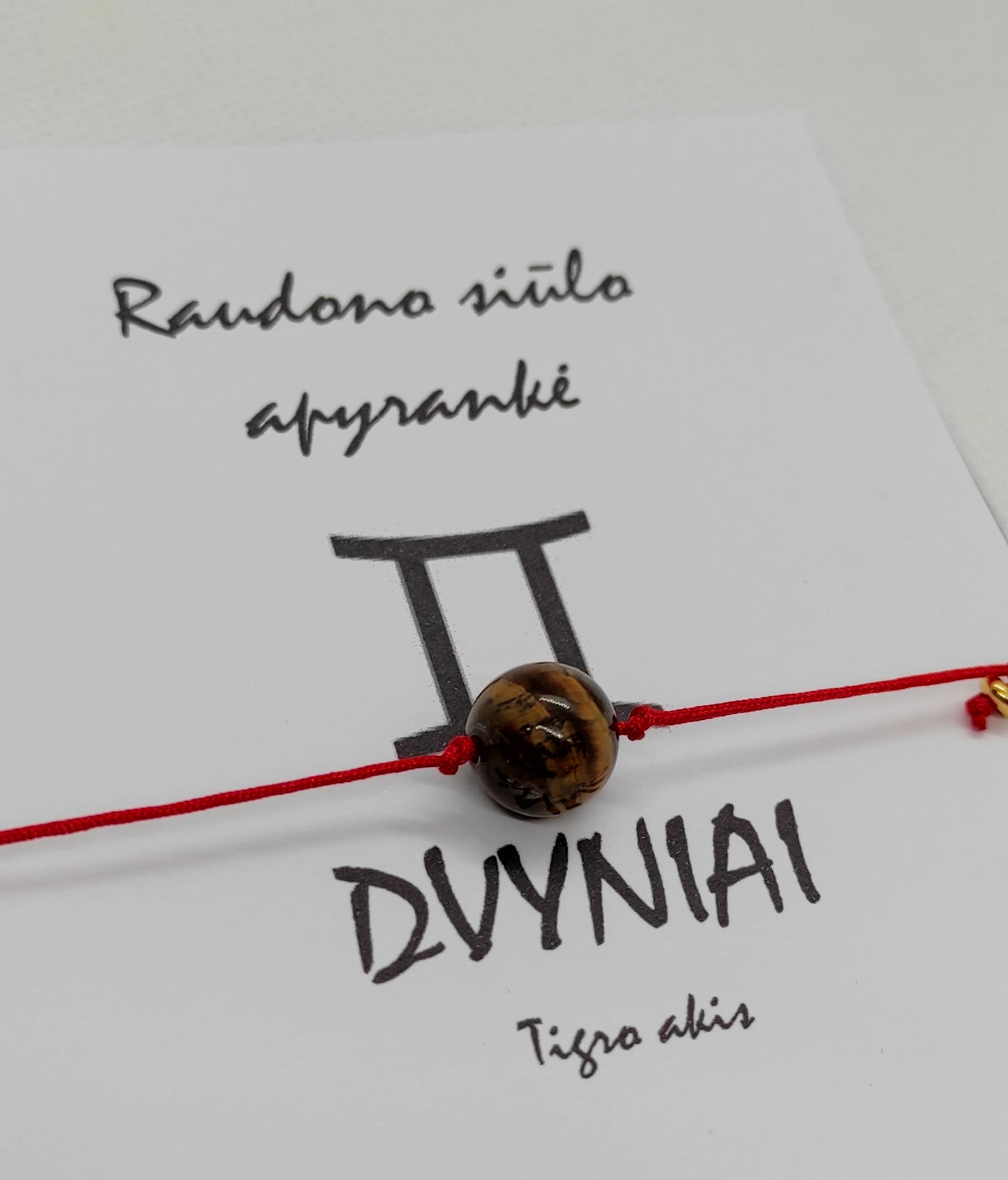 Raudono siūlo apyrankė pagal zodiaką "Dvyniai"